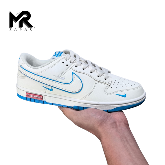 N**K SB DUN**K LOW -  SUPR**EME BLANCO / AZUL UNIVERSITARIO (SPECIAL EDITION)